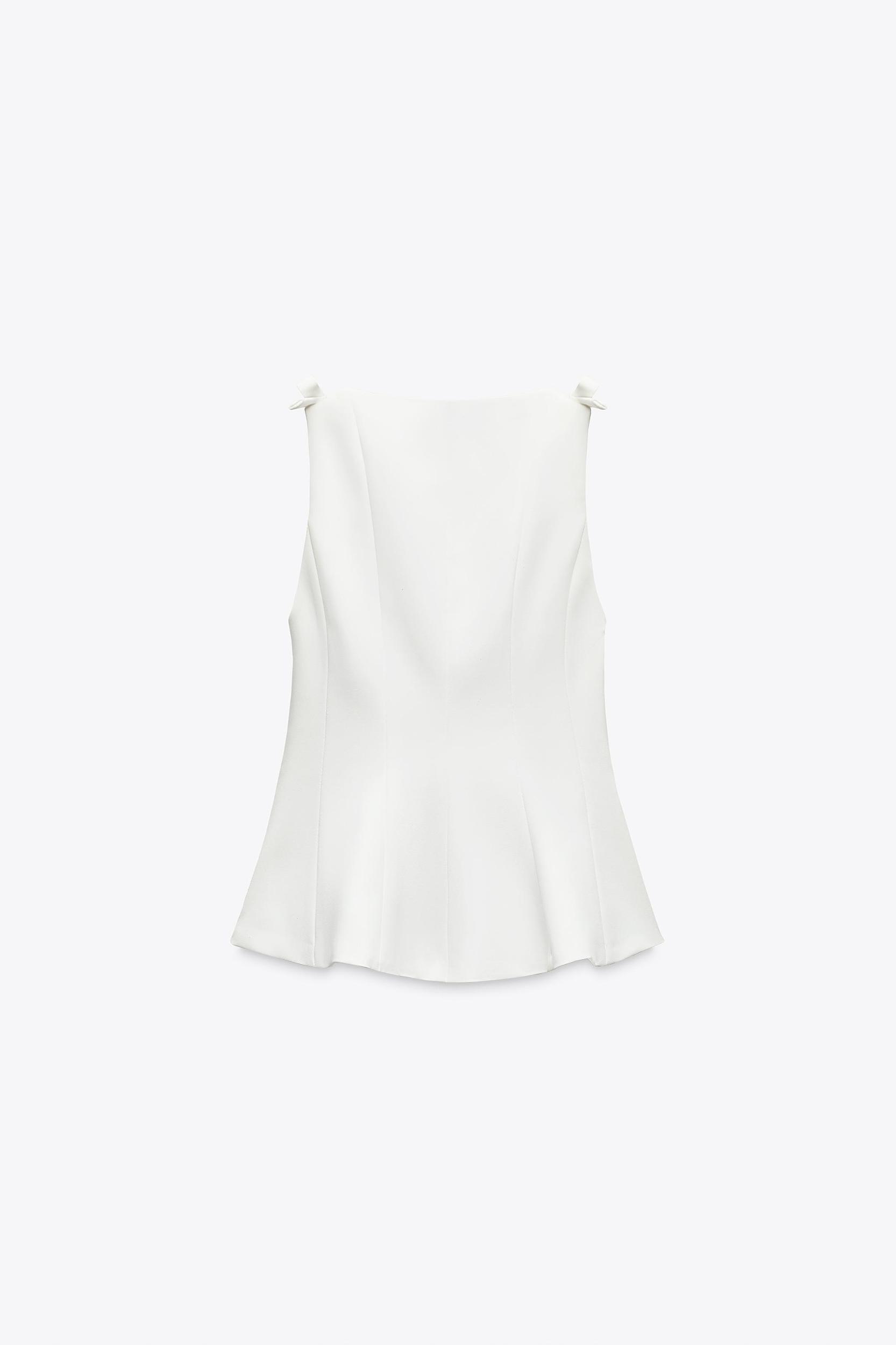 PEPLUM BOWS TOP Product Image