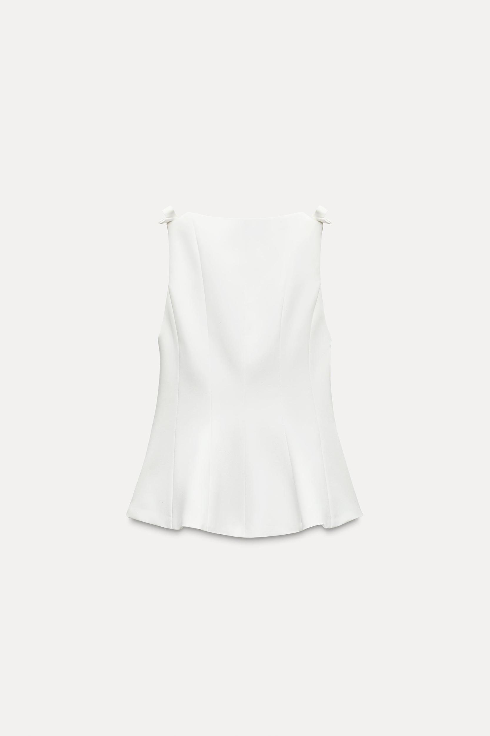 PEPLUM BOWS TOP Product Image
