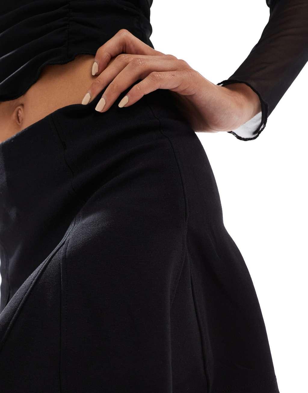 Bershka knit flippy mini skirt in black Product Image
