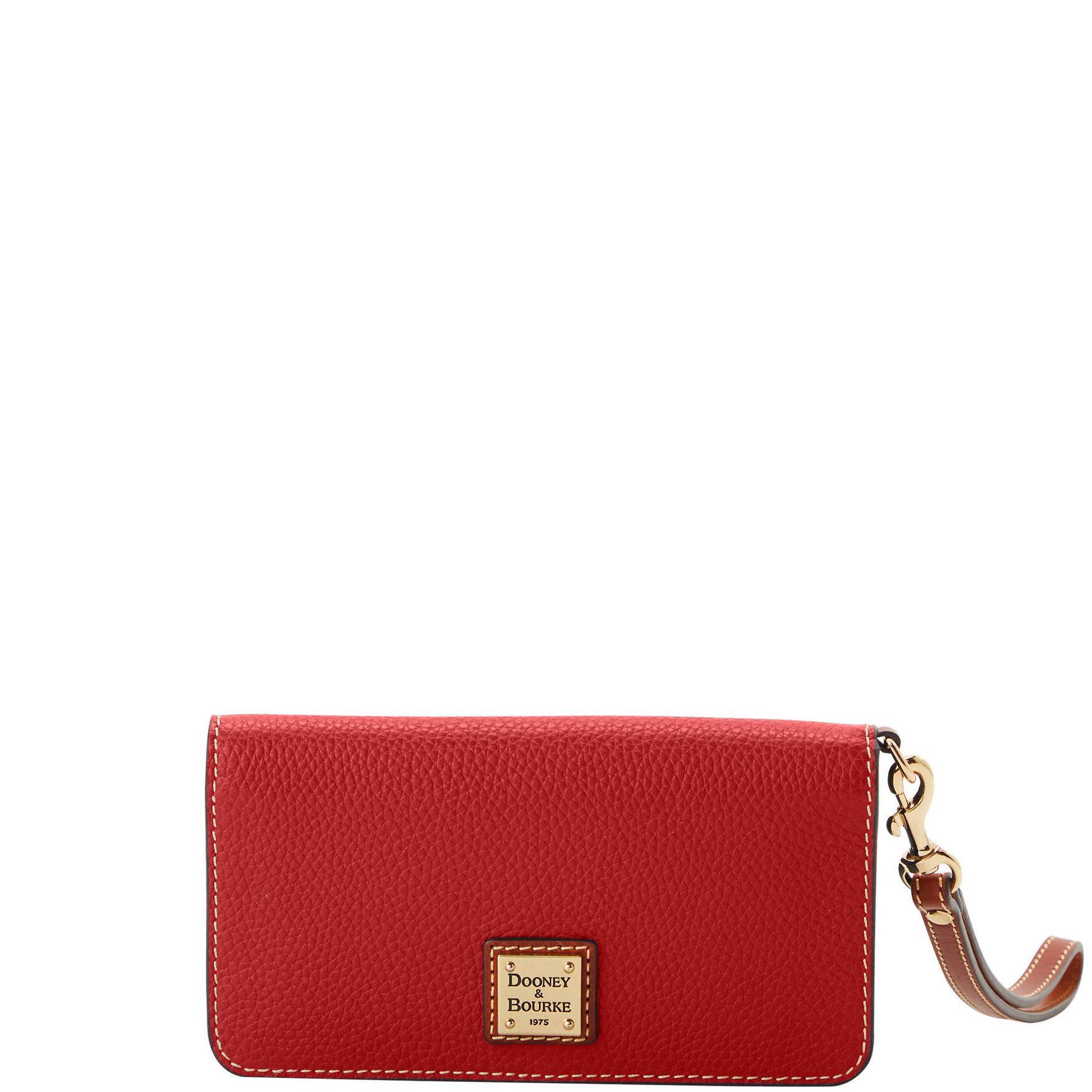 Dooney & Bourke Womens Pebble Grain Fey Phone Leather Wristlet in Red Product Image