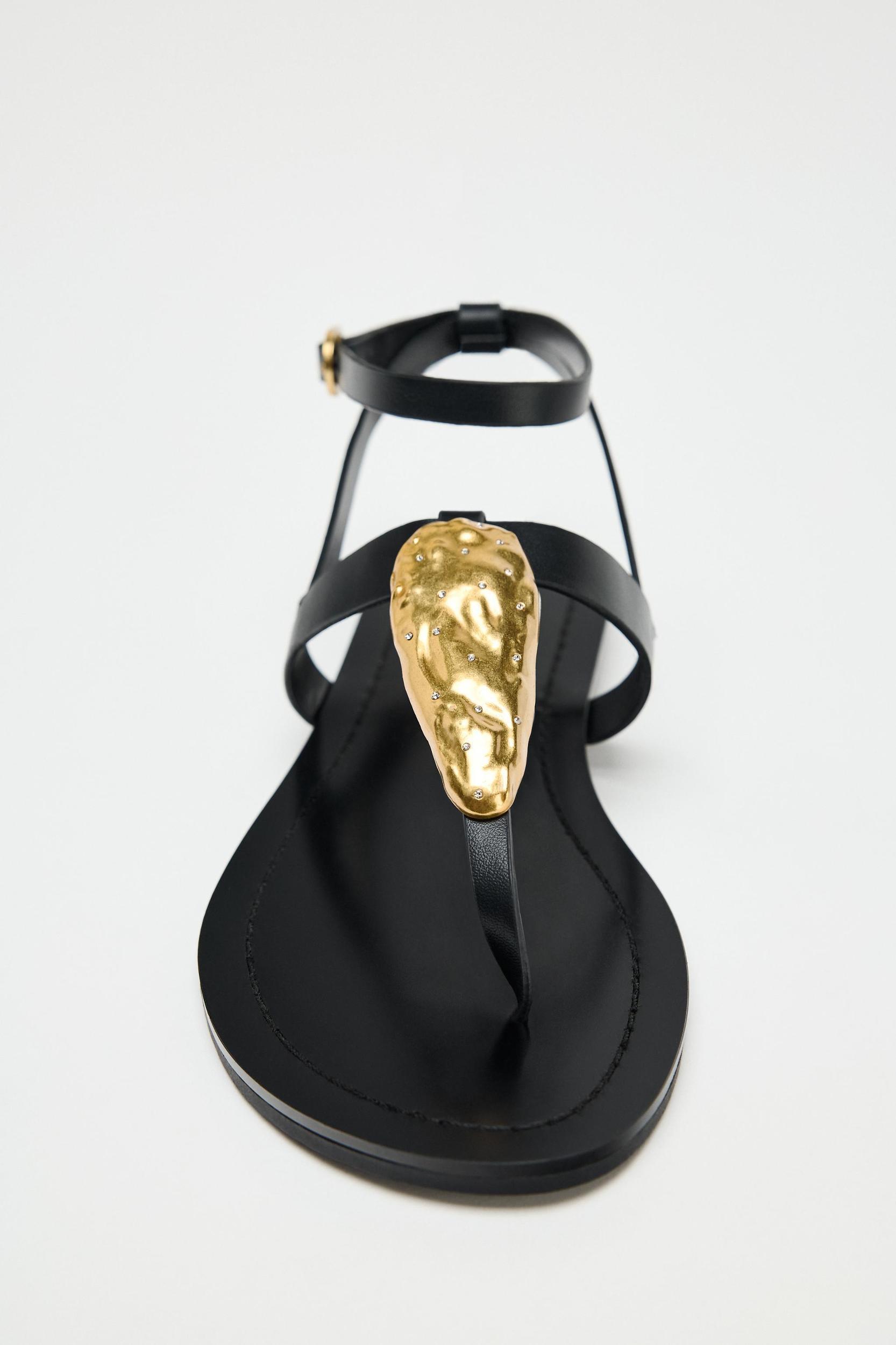 FLAT SANDALS WITH METALLIC PIECE Product Image