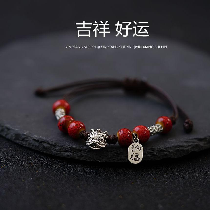 Beaded Lion Charm Bracelet Product Image