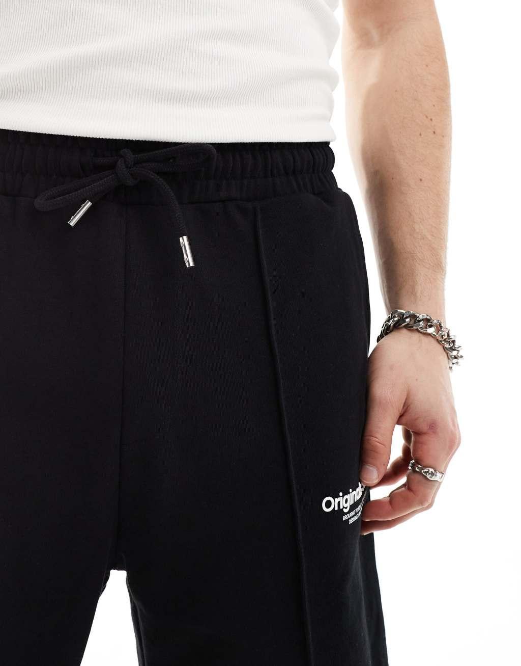 Jack & Jones loose fit jersey shorts with logo in black  Product Image