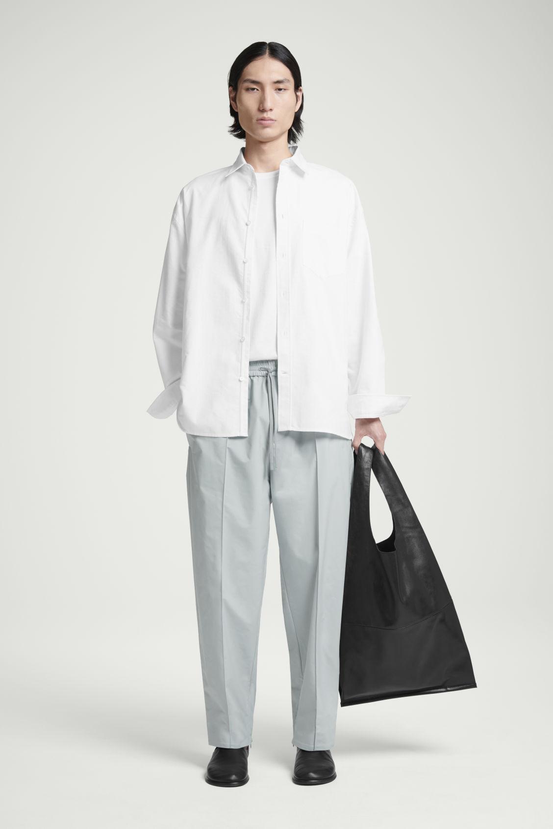 PINTUCKED TAPERED TRACK PANTS Product Image