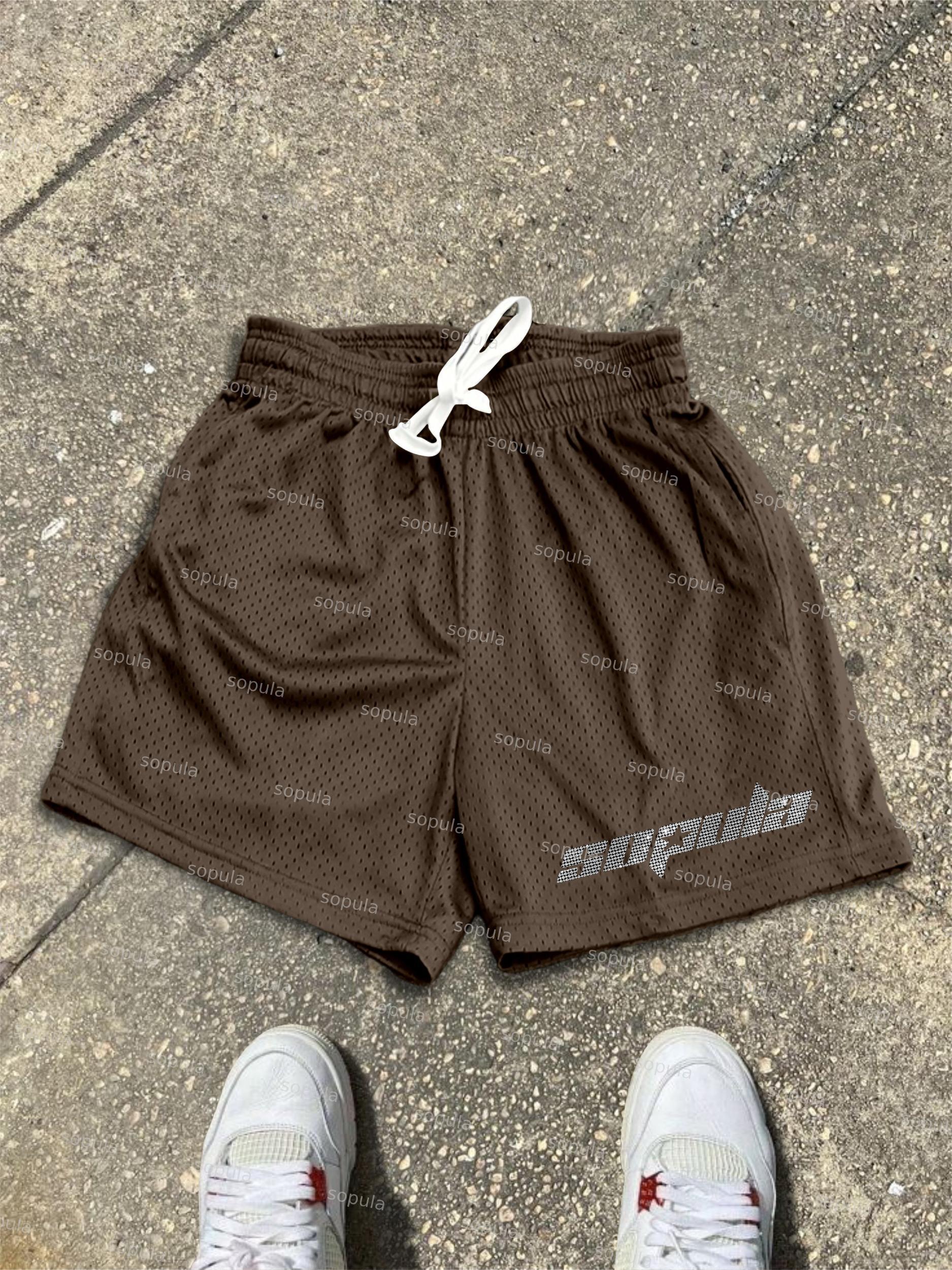 Cross Graphic Dot Mesh Shorts Product Image