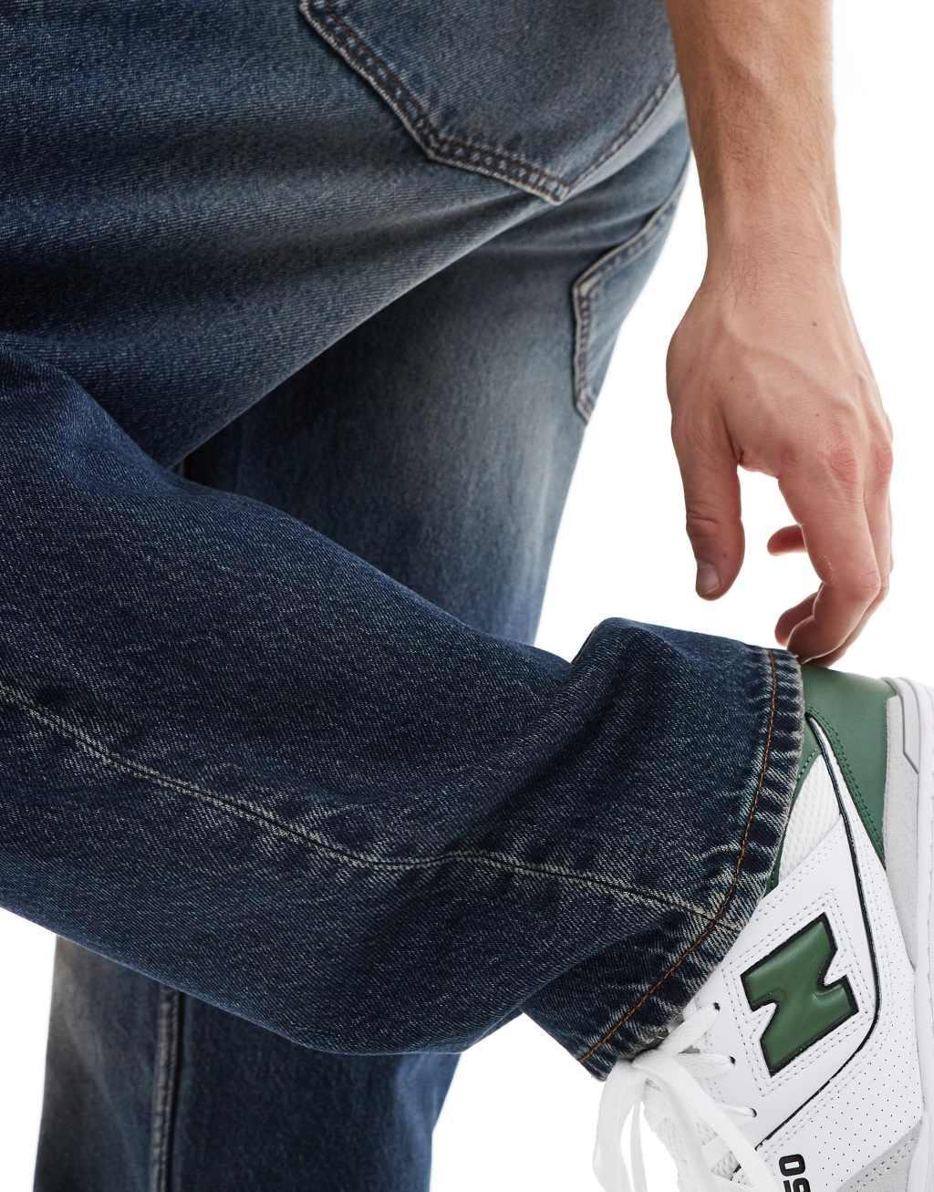 ASOS DESIGN baggy jeans in mid wash blue with heavy wash Product Image