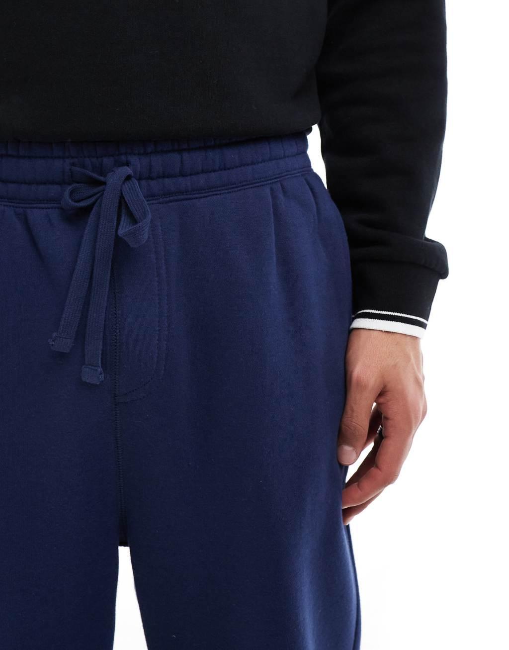 Cotton On baggy cuffed track pant in indigo Product Image