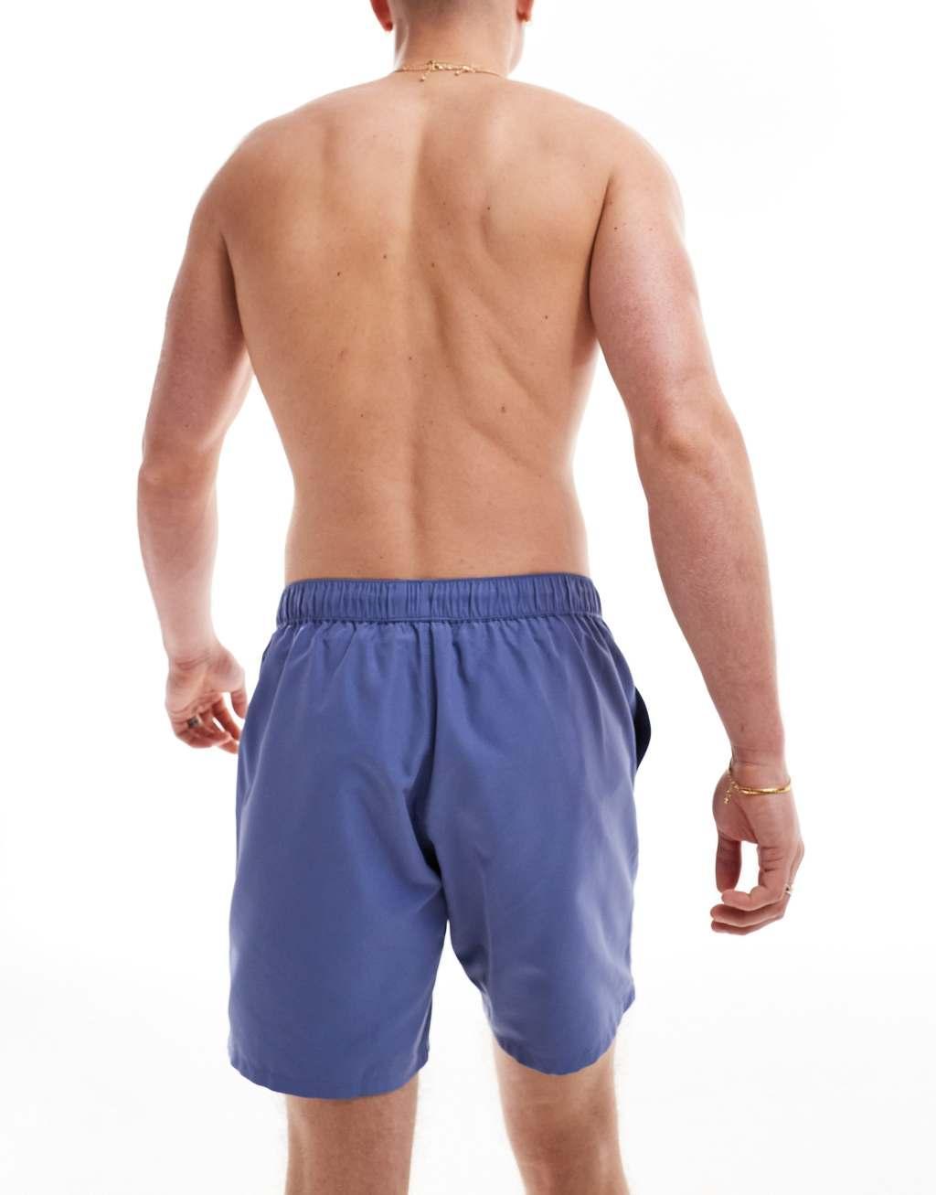 ASOS DESIGN swim shorts in mid length in blue Product Image