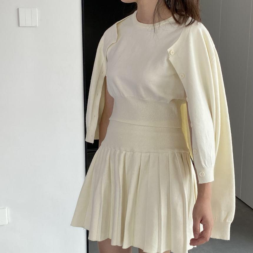 Set: Short-Sleeve Round Neck Plain Knit Top + Mid Waist Plain Mini Pleated Skirt + Round Neck Button Cardigan Product Image