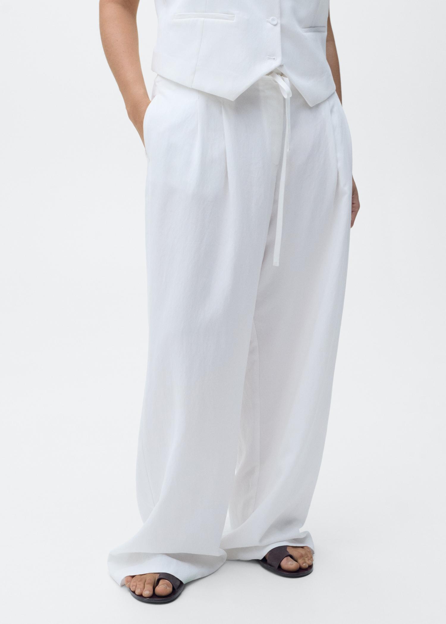Lyocell suit pants with bow belt - Women | MANGO USA Product Image