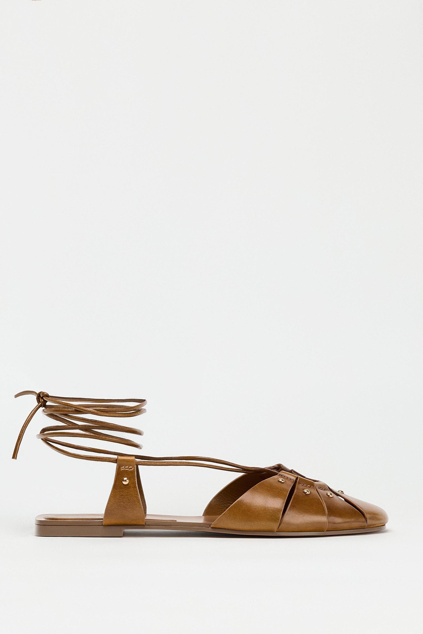 LEATHER TIED CAGE SANDALS Product Image