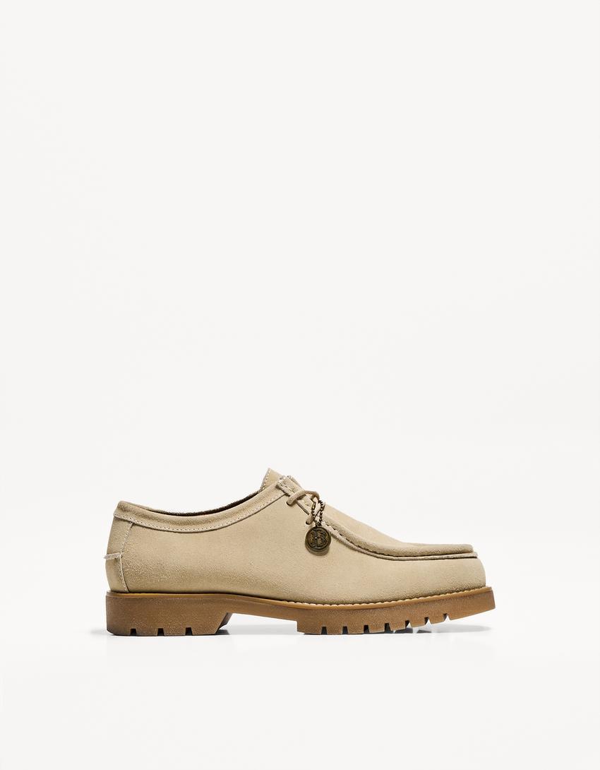 Split leather deck shoes with keyring detail Product Image