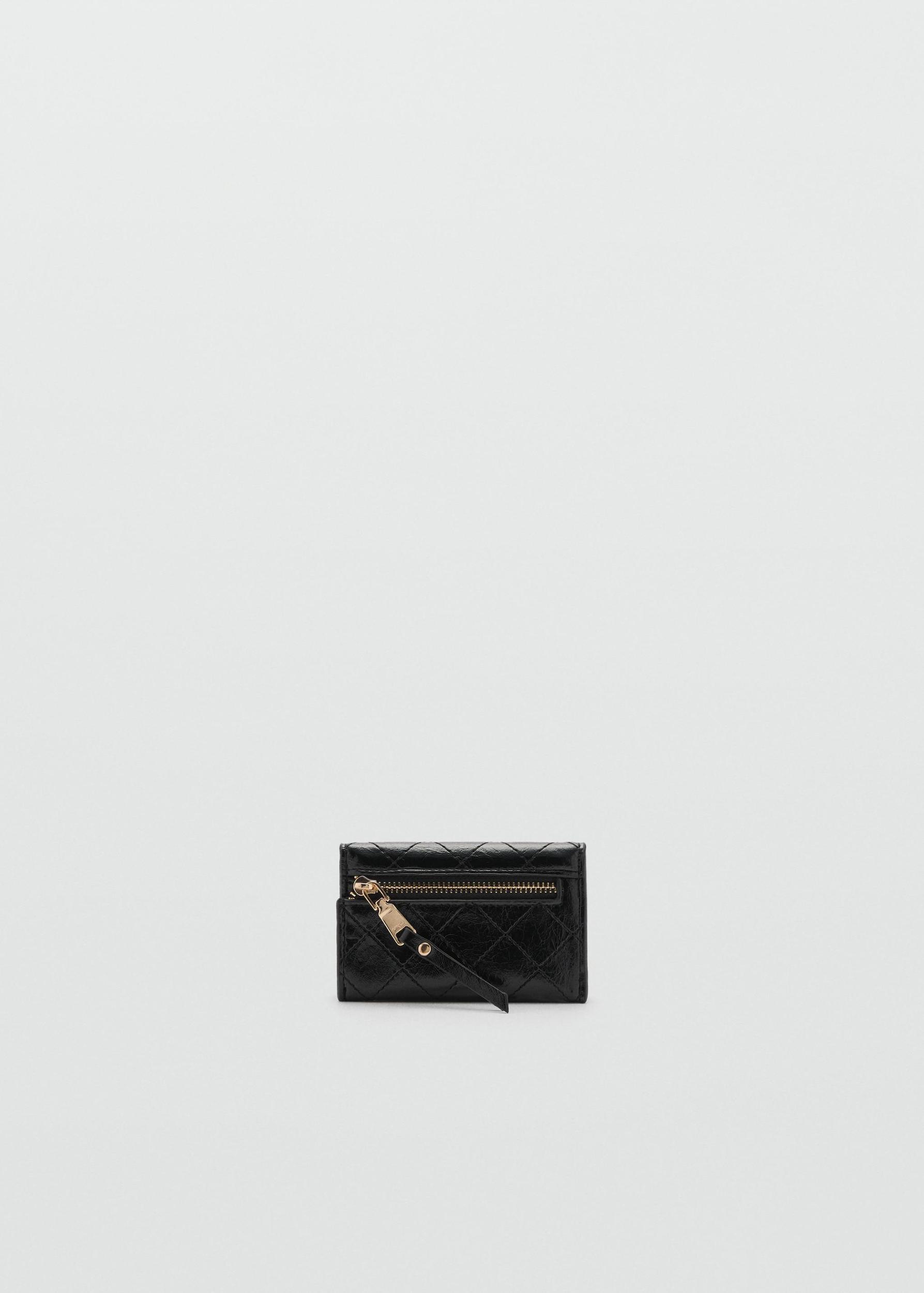Coin purse with flap and decorative stitching - Women | MANGO USA Product Image
