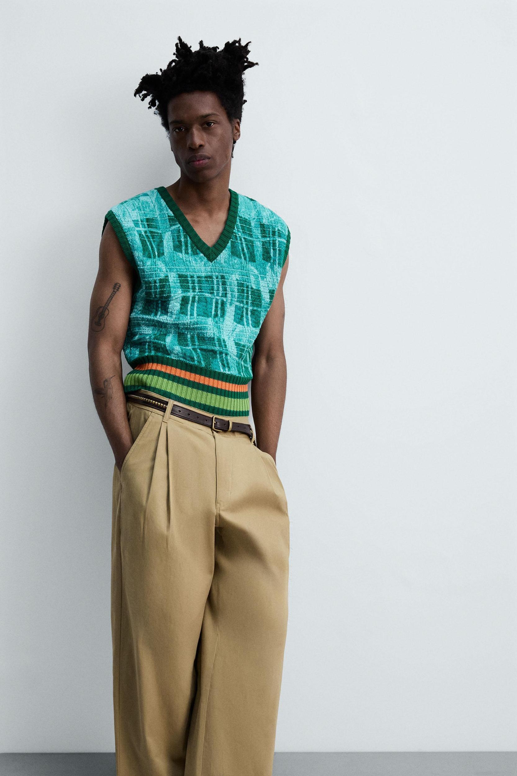 PLEATED WIDE FIT PANTS Product Image