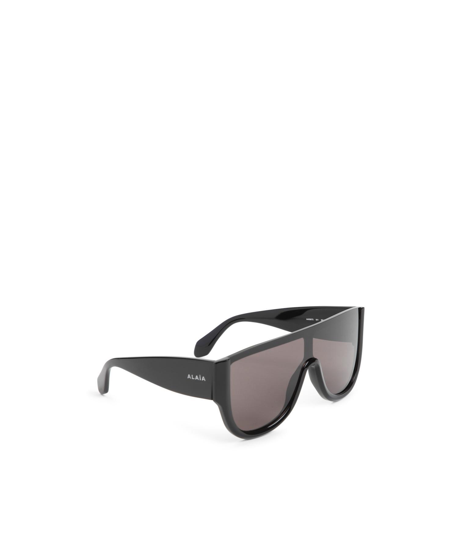 ALAÏA Geometric Frame Sunglasses In Black Product Image