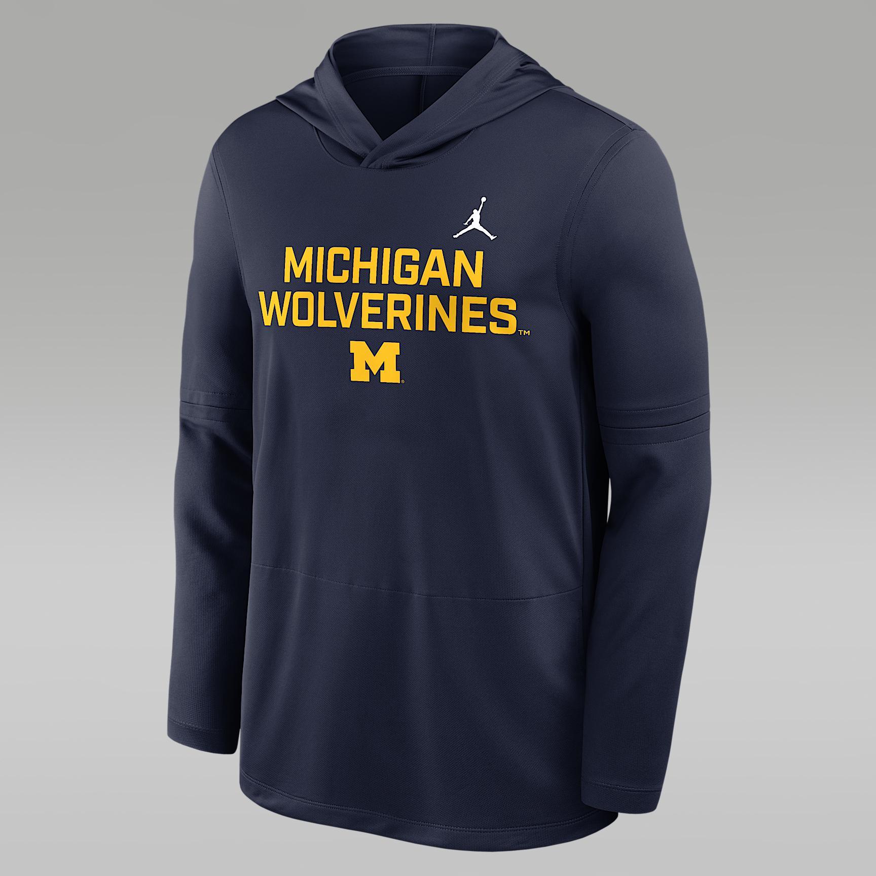 Michigan Sideline Men's Jordan Brand Dri-FIT College Long-Sleeve Hooded Top Product Image