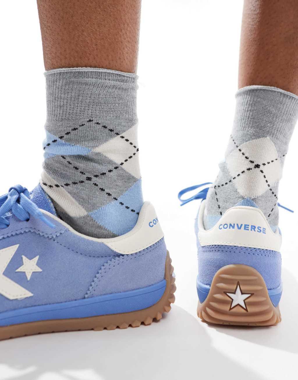 Converse Run Star Sneakers in blue with white detail and gumsole Product Image