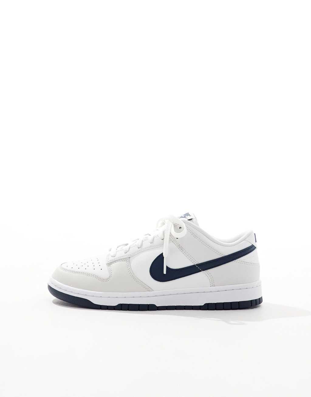Nike Dunk Low Retro sneakers in white and navy Product Image