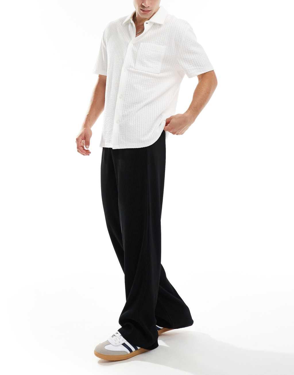 ASOS DESIGN smart wide leg plisse pants in black Product Image