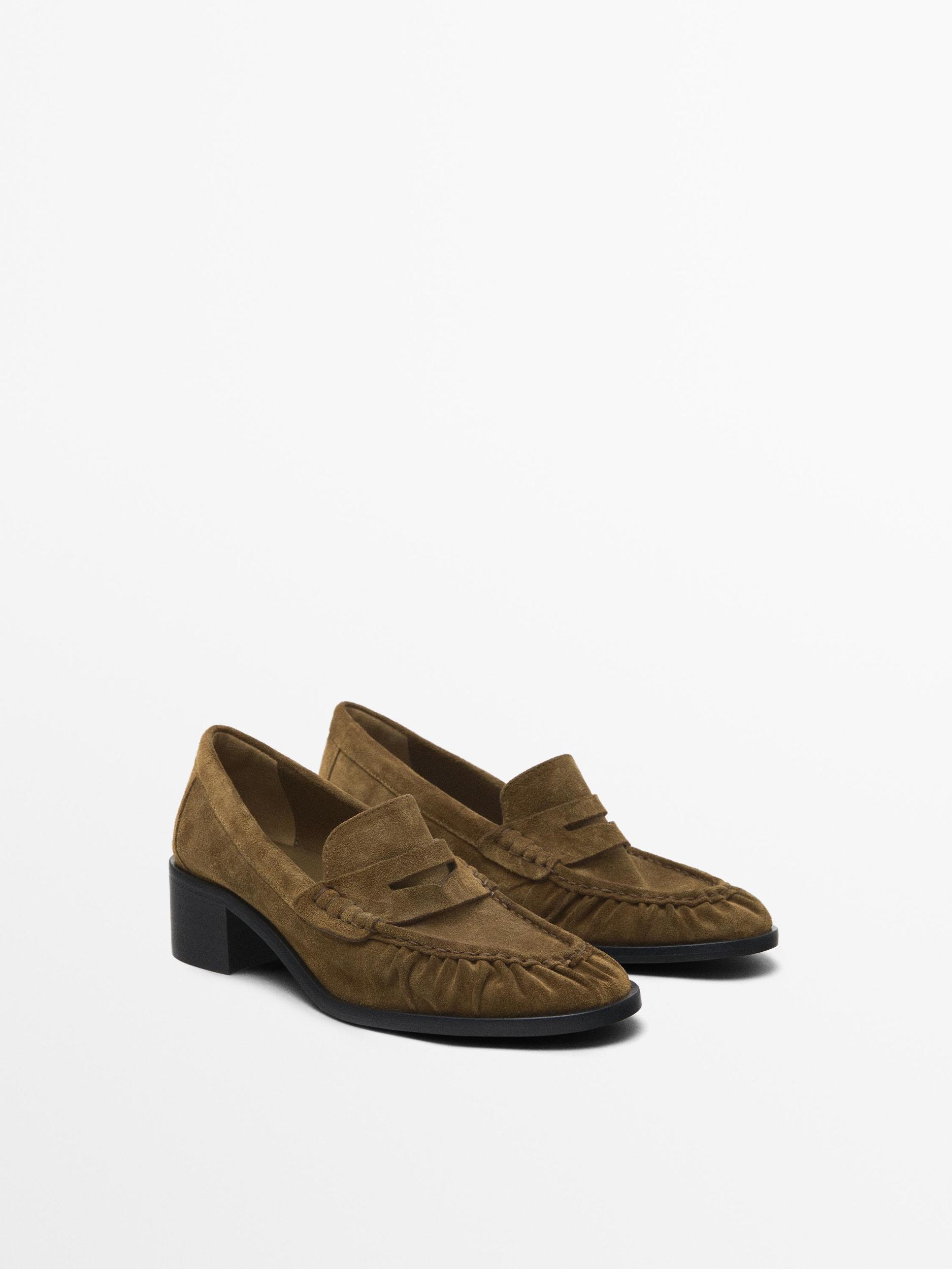 Split leather heeled loafers Product Image