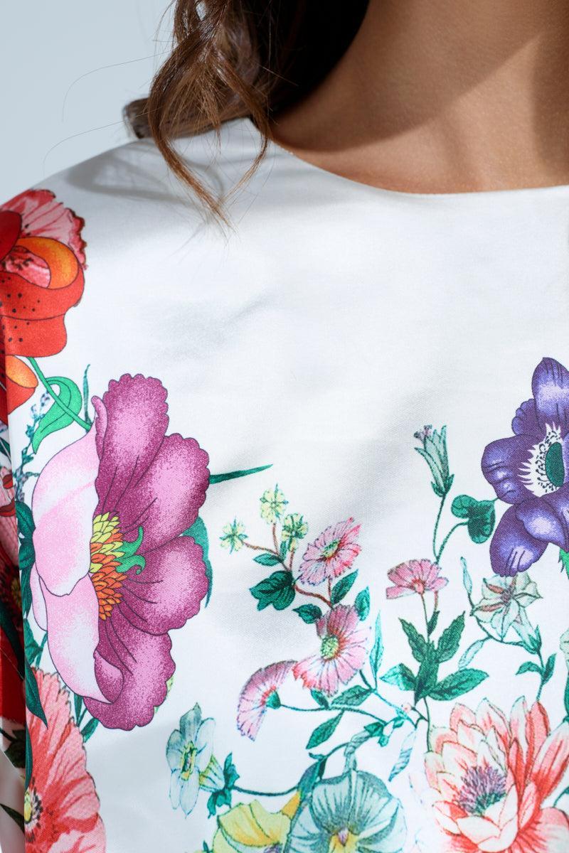 FULL BLOOM ZIP OFF SLEEVES BLOUSE Product Image