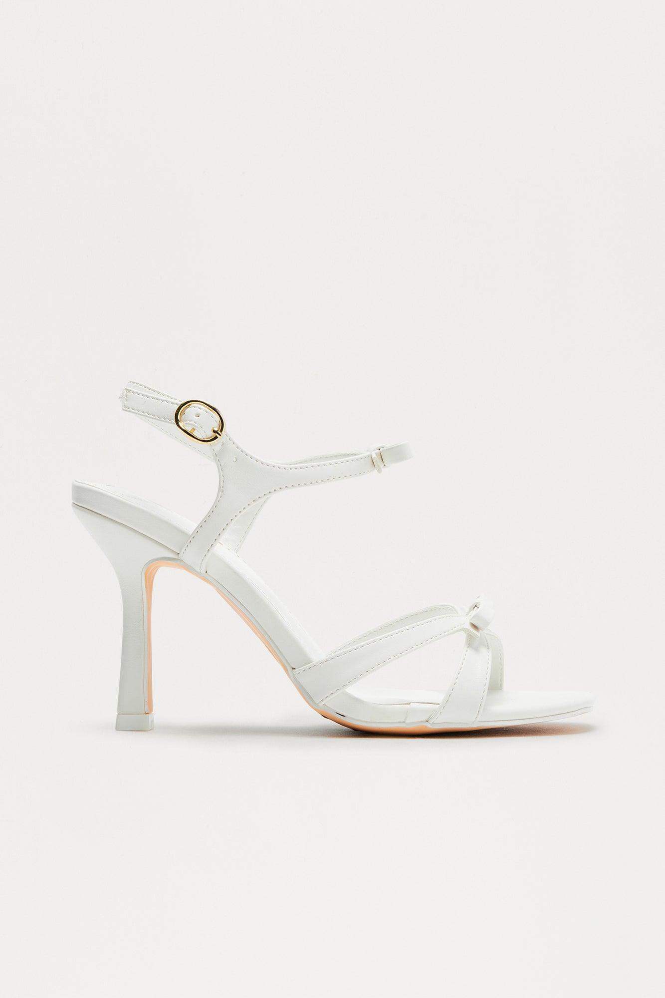 Breigh Bow Faux Leather Ankle Strap Heels - White Product Image