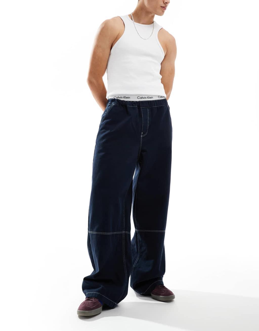 ASOS DESIGN super baggy jeans in white with elastic waistband Product Image