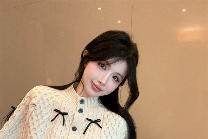 Set: Stand Collar Bow Cable Knit Button Capelet + Long Sleeve Ribbed Knit Top Product Image