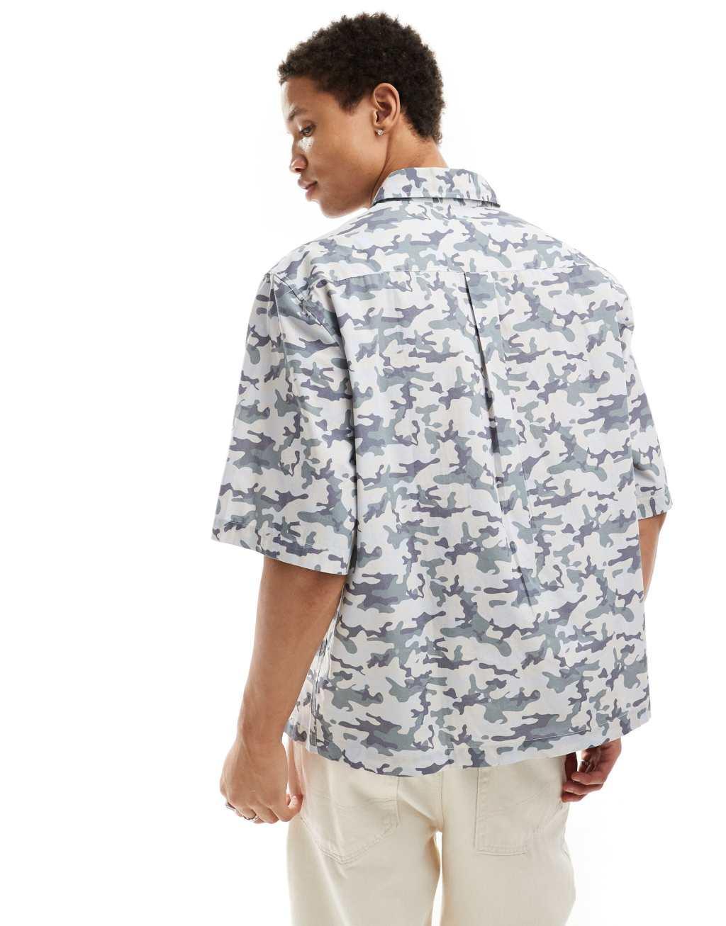 COLLUSION boxy skater shirt in washed blue camo print Product Image