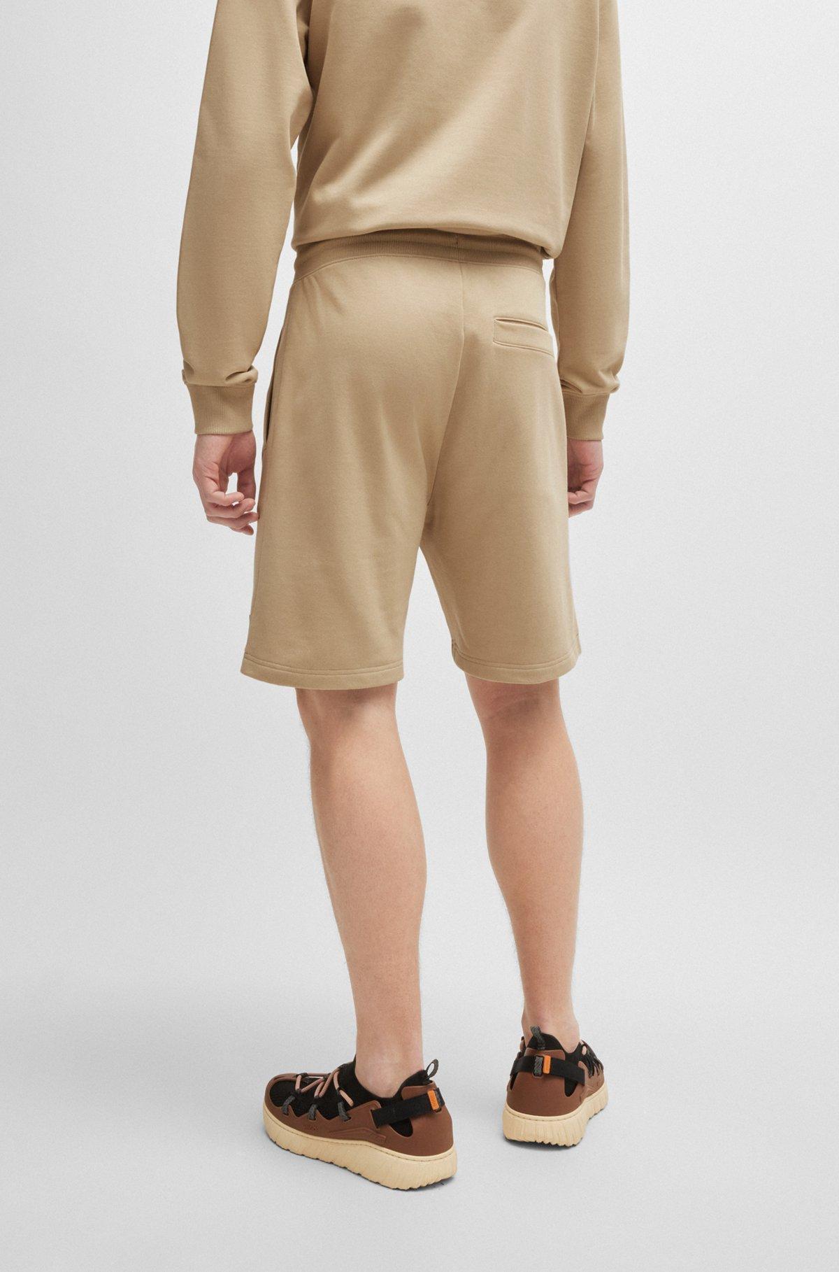 Cotton-terry relaxed-fit shorts with logo trim Product Image
