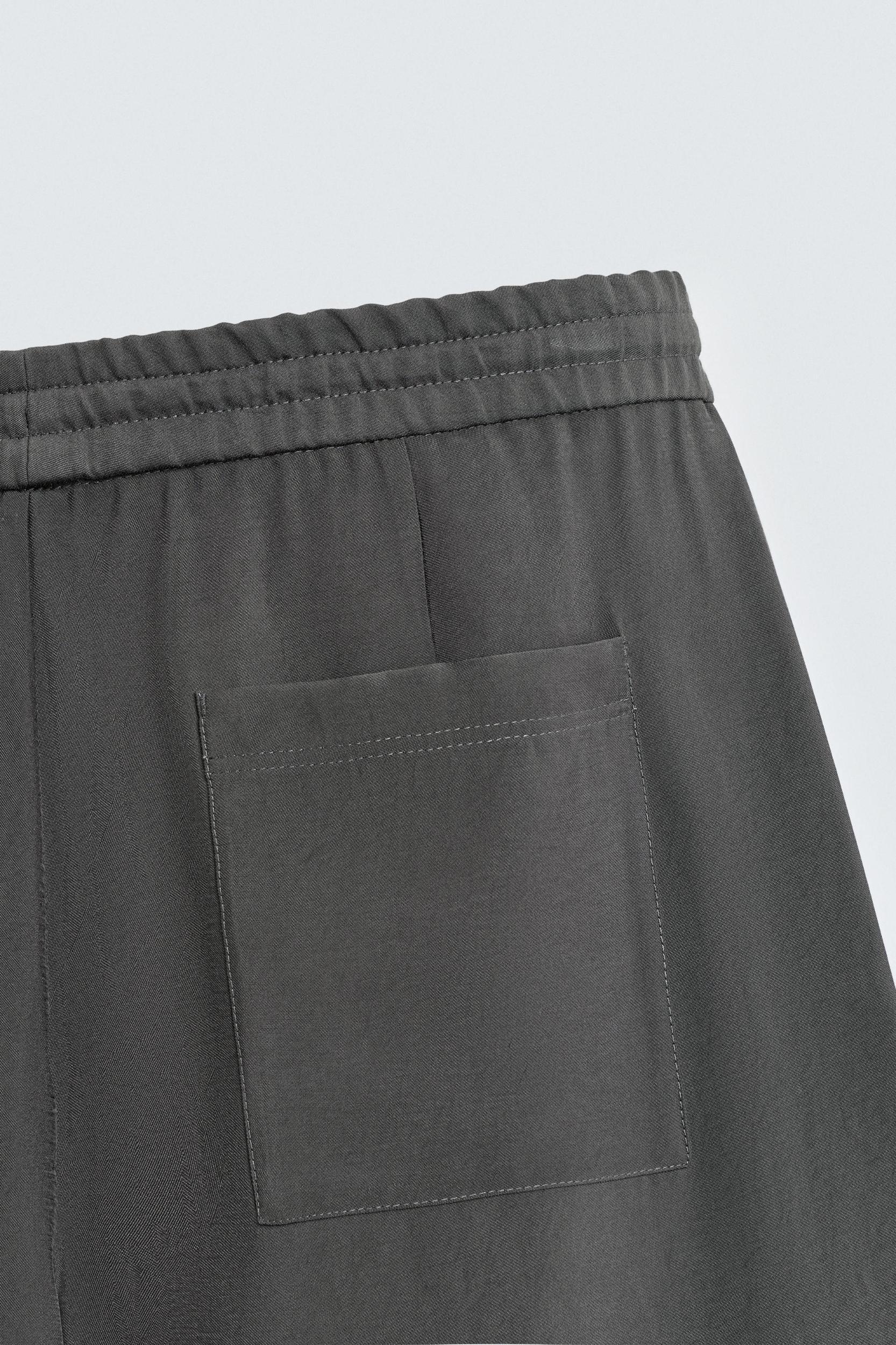 FLOWY TOPSTITCHED PANTS Product Image