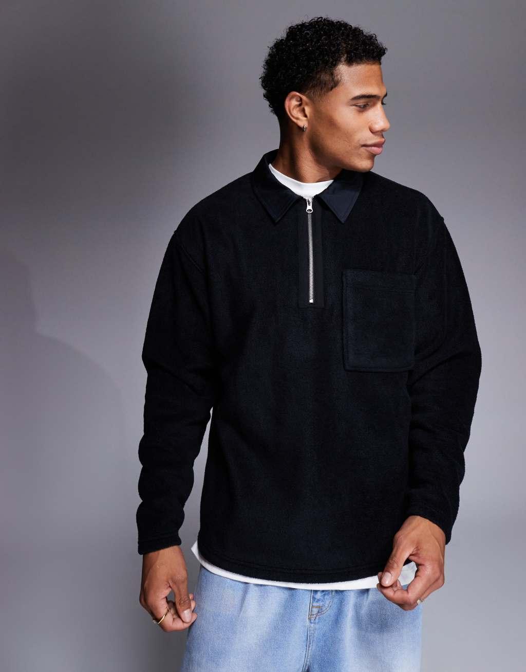 ASOS DESIGN oversized rugby polo fleece sweatshirt with quarter zip in black Product Image