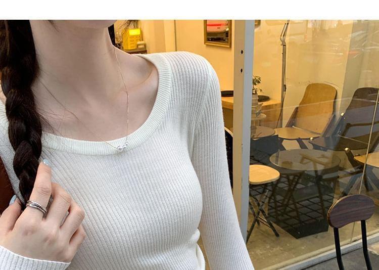 Long-Sleeve Crewneck Asymmetrical Plain Knit Top Product Image