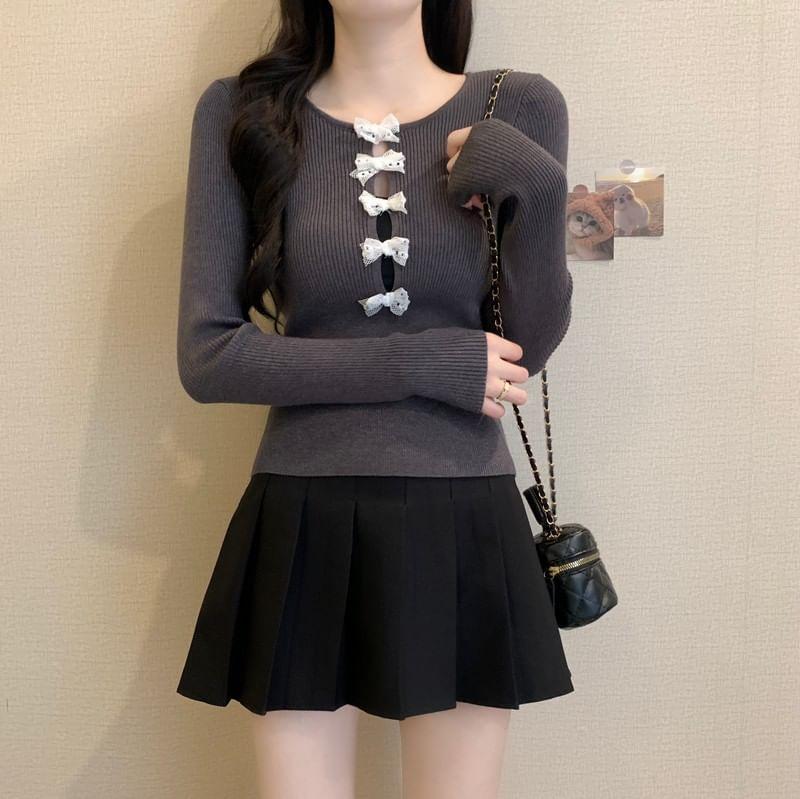 Long-Sleeve Round Neck Bow Cutout Ribbed Knit Top Product Image