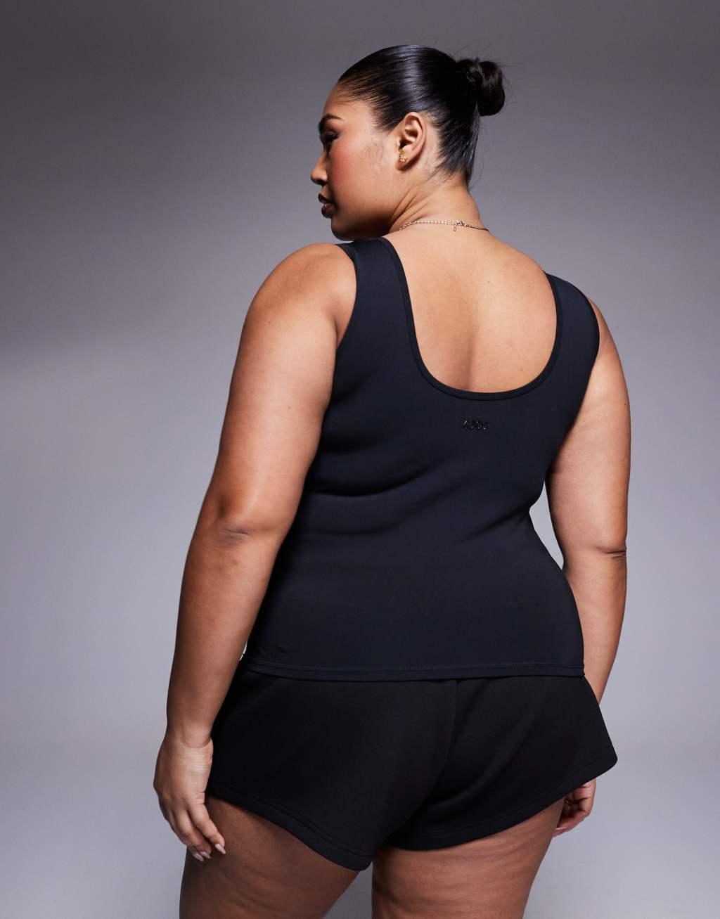4505 Curve Icon scoop neck slightly cropped training tank top in black  Product Image