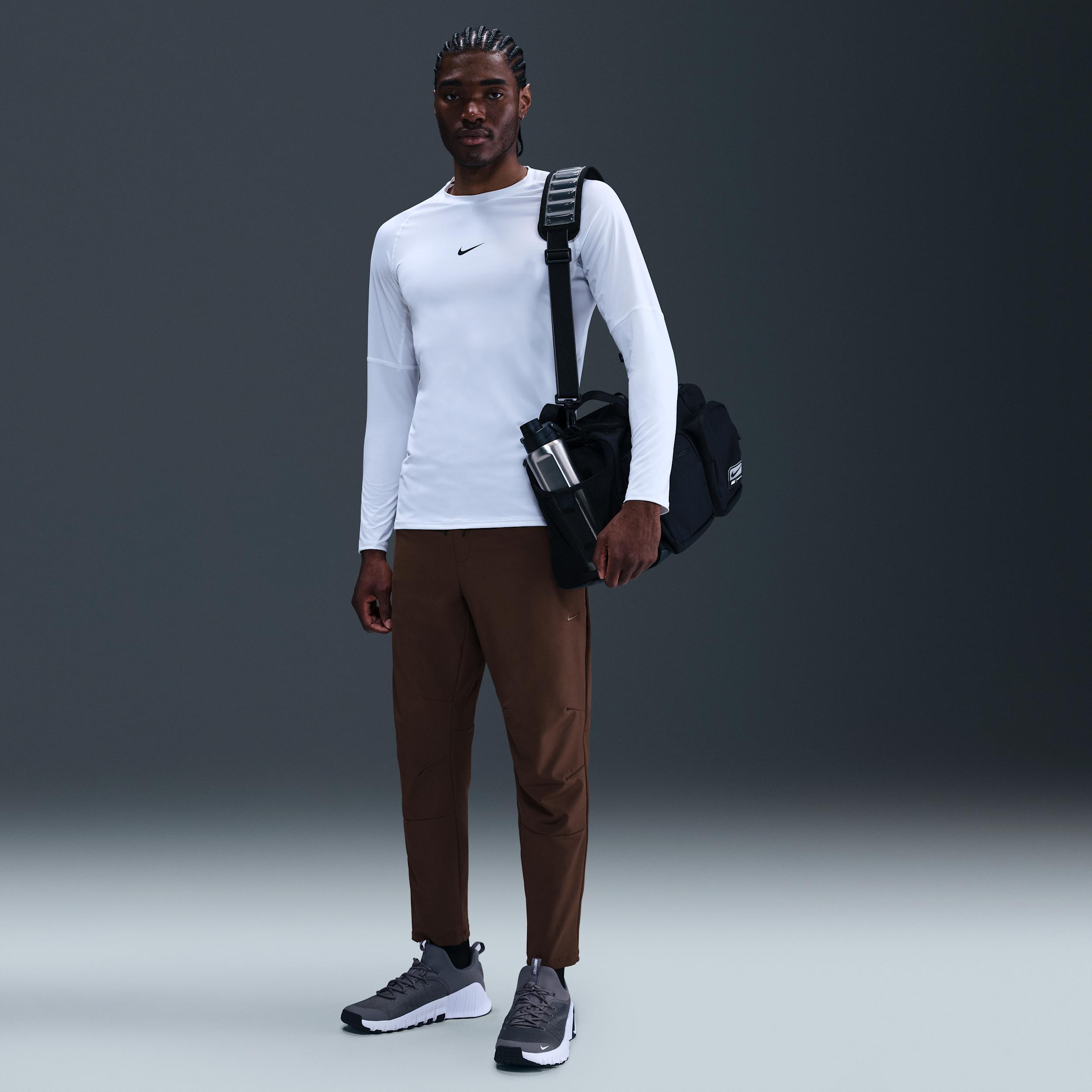 Nike Men's Unlimited Dri-FIT Tapered Leg Versatile Pants Product Image