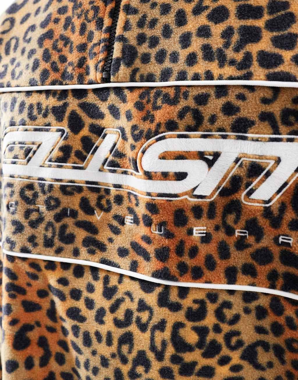 COLLUSION animal print half zip tech fleece with print  Product Image