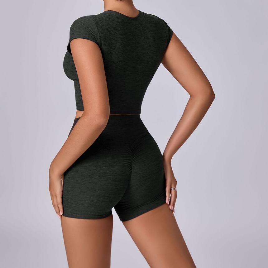 Set: Long-Sleeve Crew Neck Melange Crop Sports Top + High Waist Biker Shorts Product Image