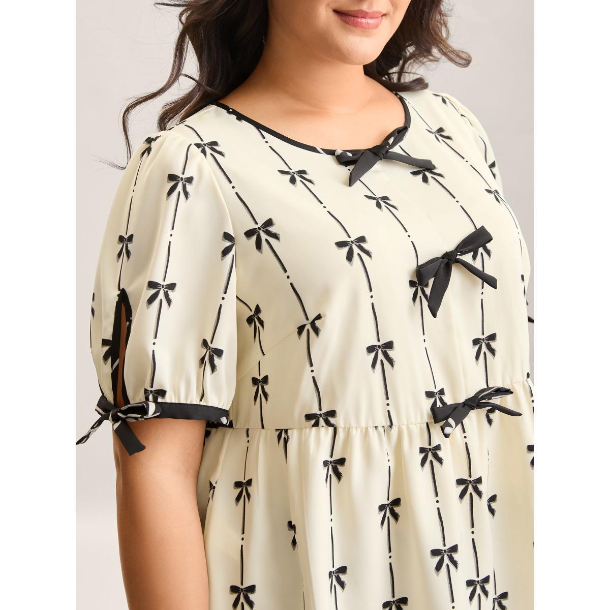 Plus Size Beige Bow Detail Printed Color Contrast Blouse Women Half Sleeve V-neck Everyday-Elegant Blouses BloomChic 12/L Product Image