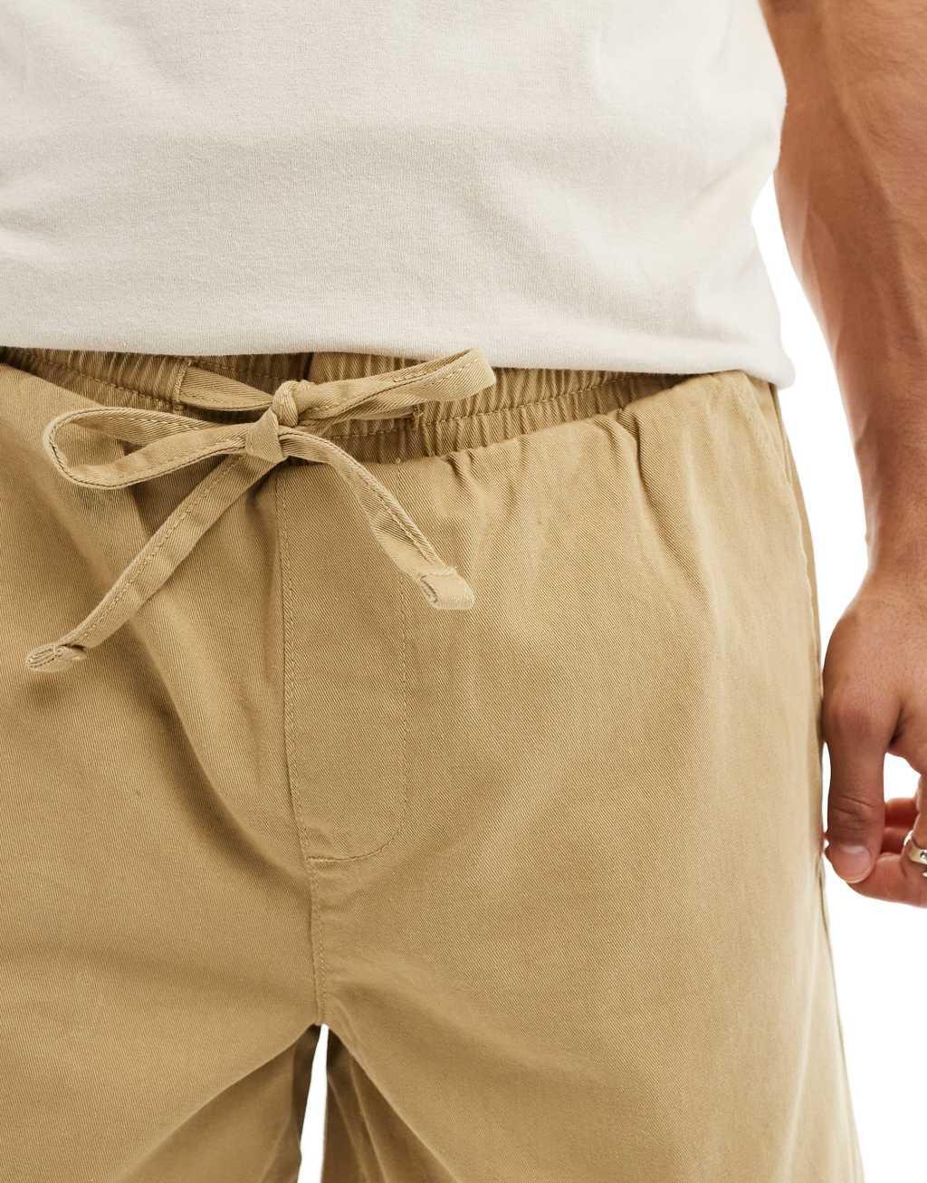 ASOS DESIGN chino shorts in tan Product Image