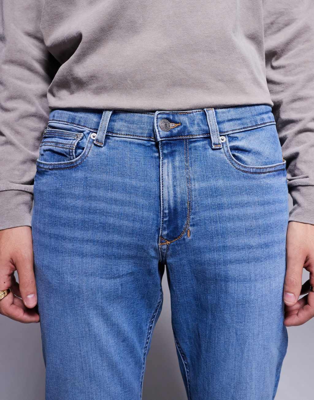 River Island slim fit jeans in medium blue Product Image