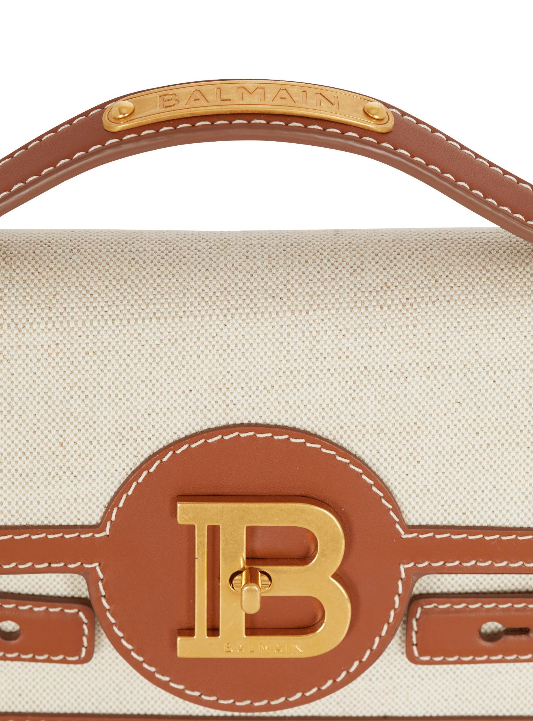 B-Buzz 24 canvas and leather bag Product Image