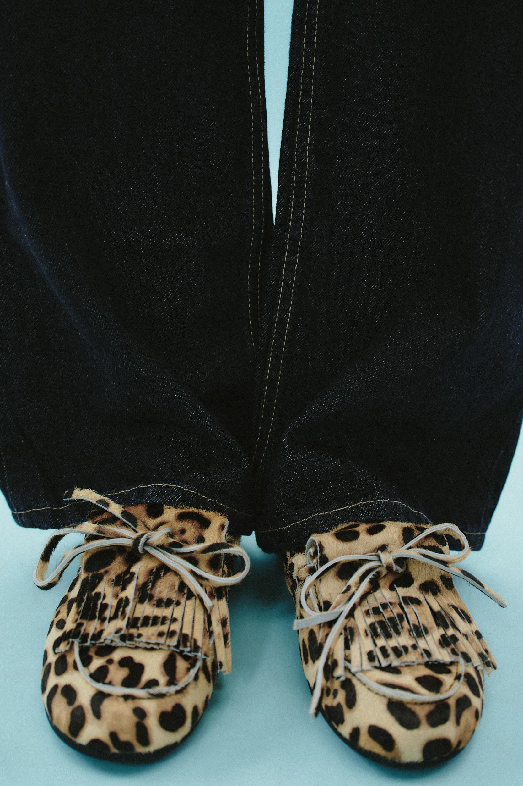 ANIMAL PRINT FUR LINED LEATHER LOAFERS Product Image