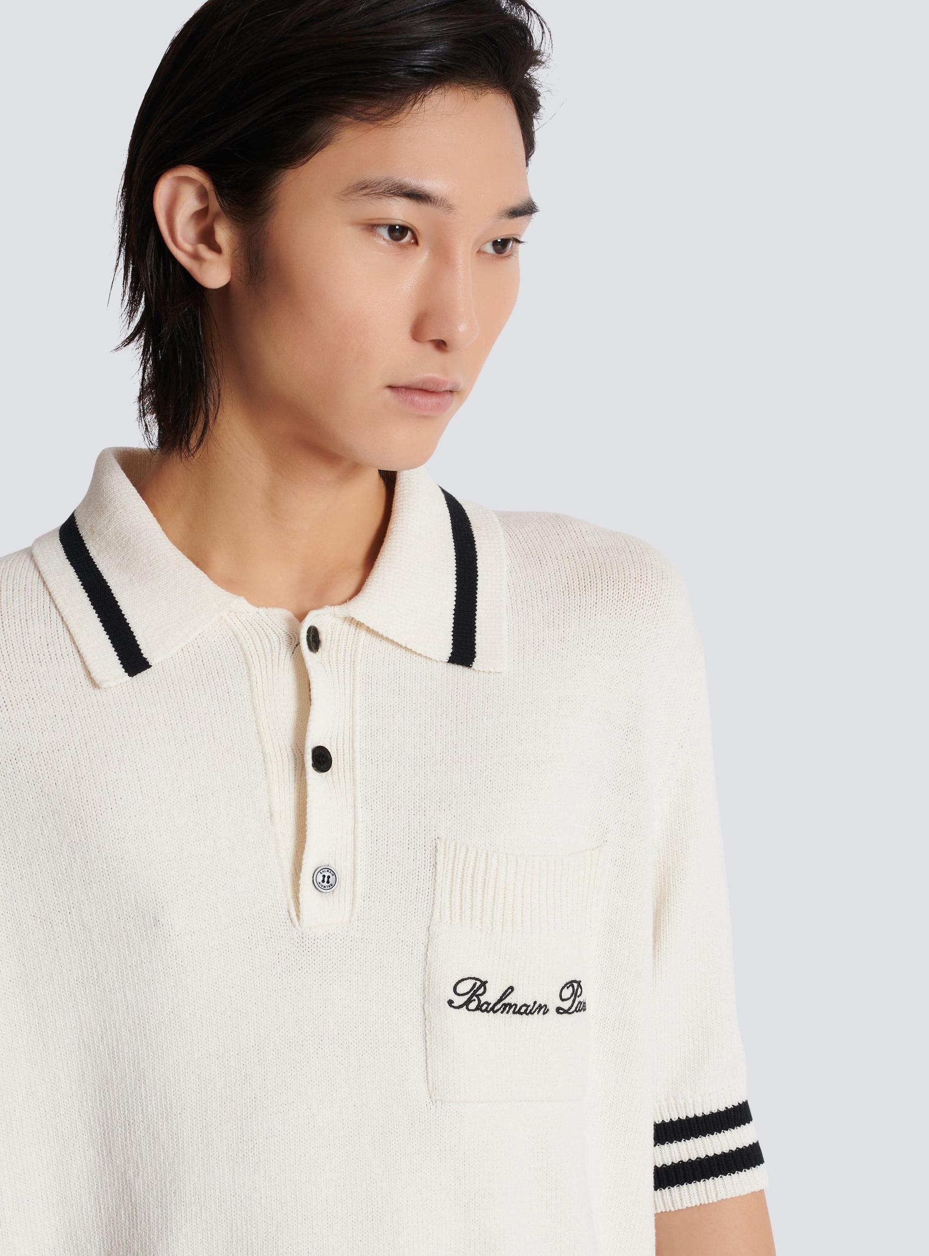 Wool polo shirt with Balmain Signature embroidery Product Image
