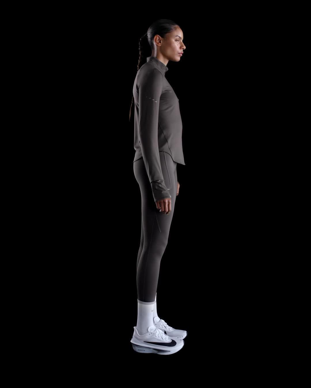 Nike Women's Swift Dri-FIT UV 1/4-Zip Running Top Product Image