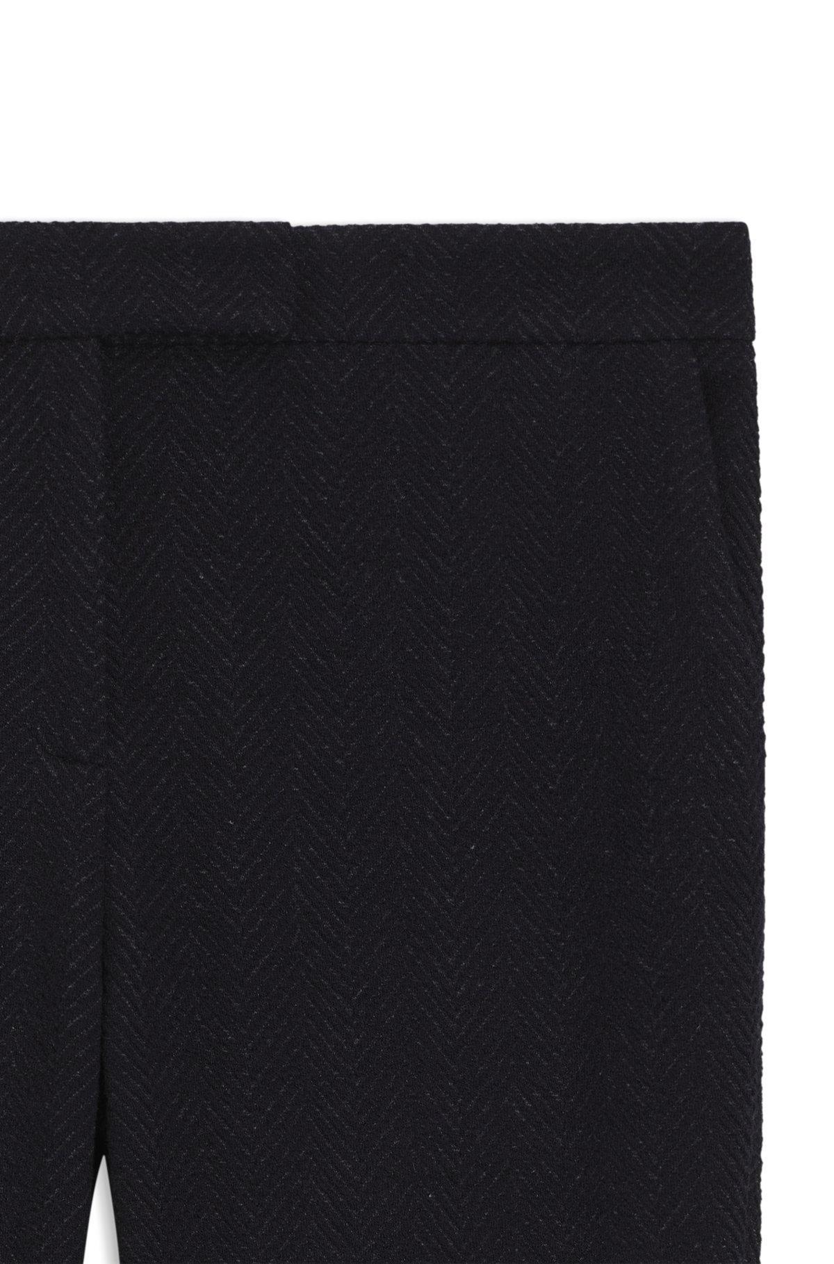 Slim-fit trousers in crease-resistant herringbone stretch jersey Product Image