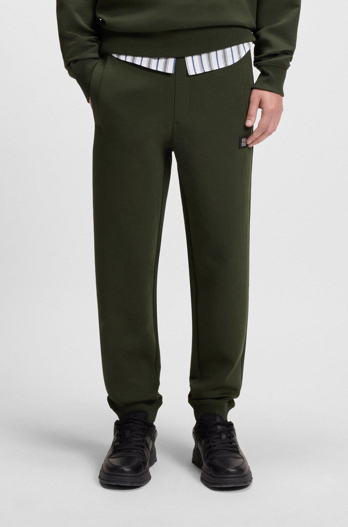 HUGO - Cotton tracksuit bottoms with stacked logo - Dark Green Product Image