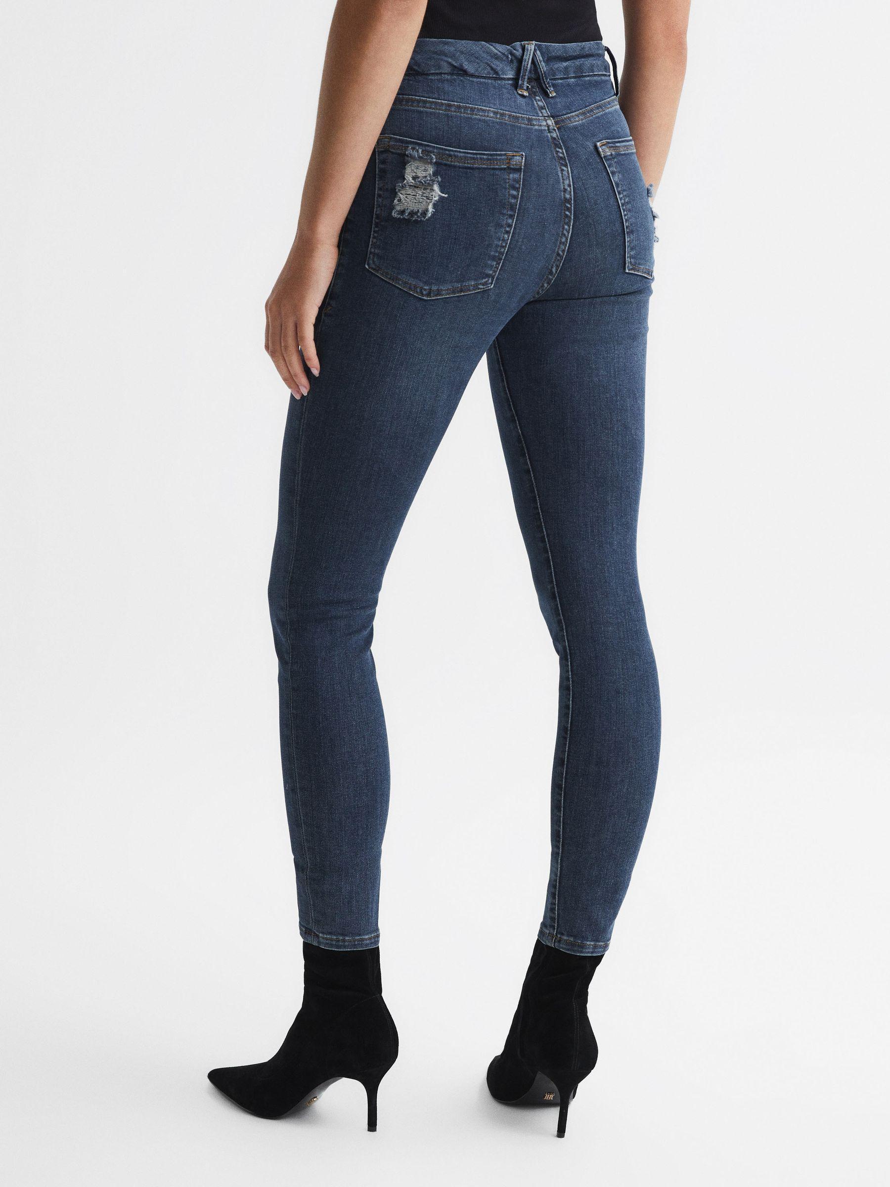 Good American Released Hem Skinny Jeans in Dark Blue Product Image