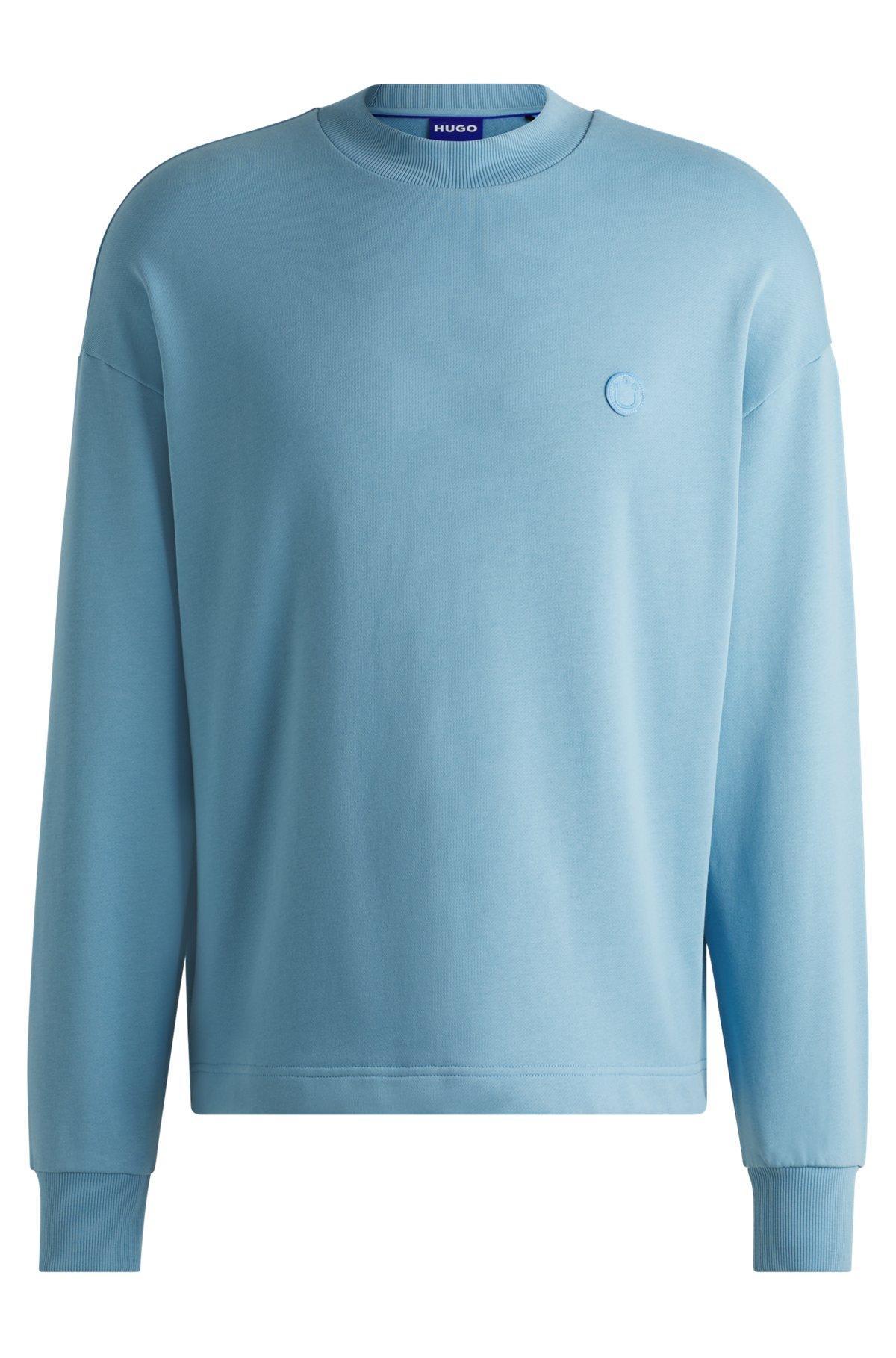 Cotton-terry sweatshirt with Happy HUGO logo patch Product Image