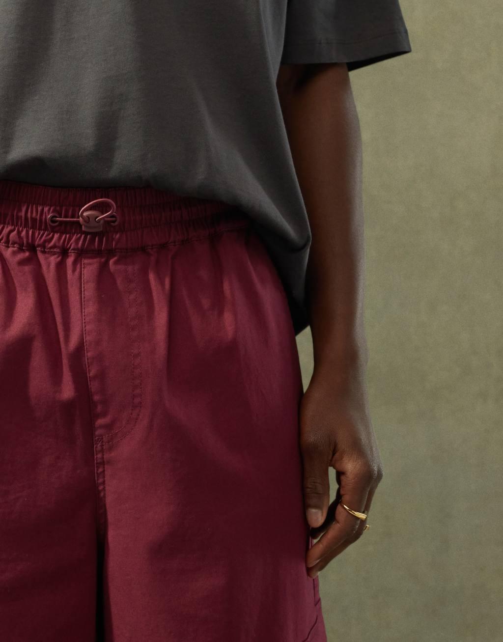 ASOS DESIGN super baggy cargo pants with elastic waist in burgundy Product Image